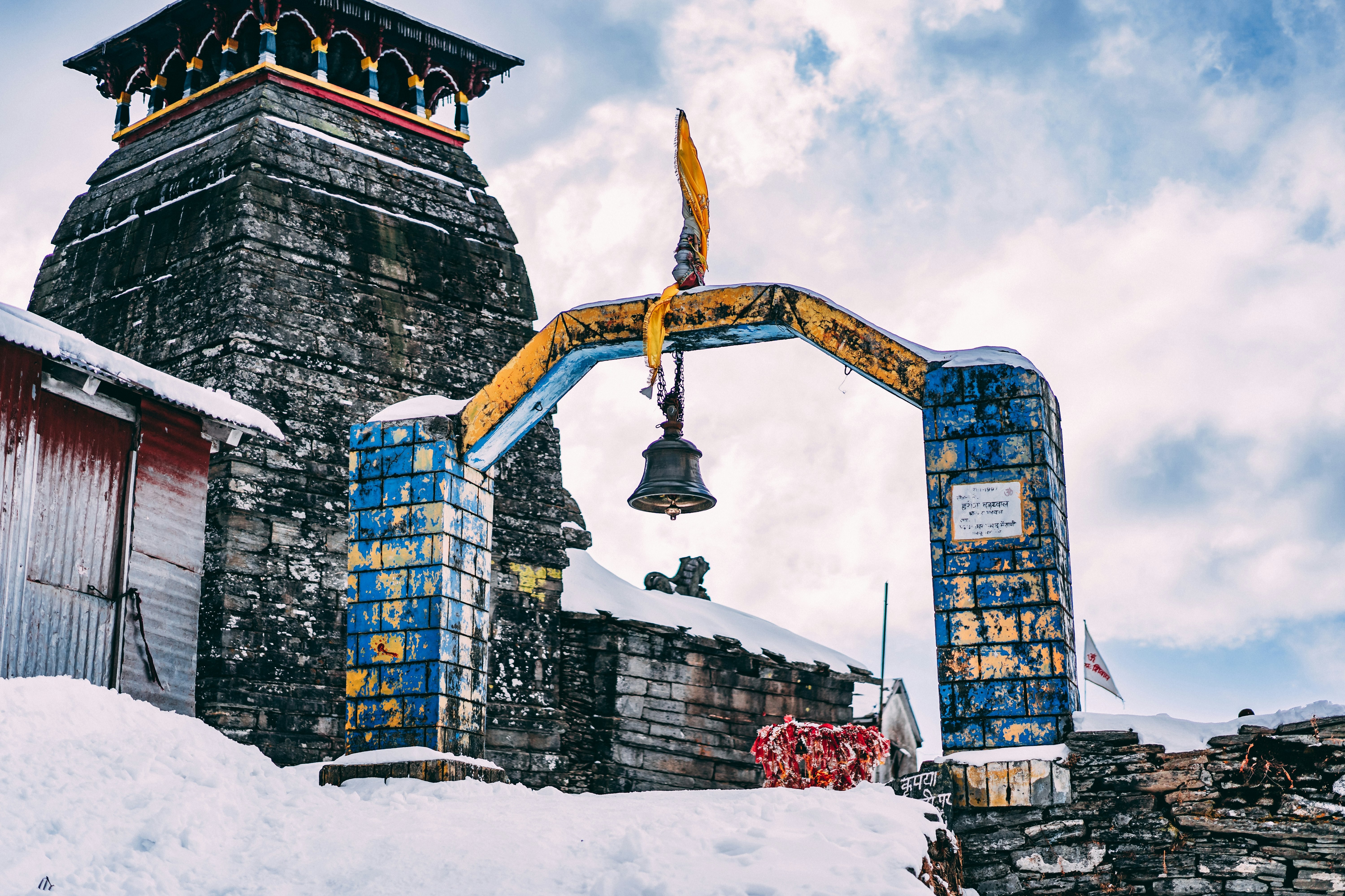 black bell on arch gate